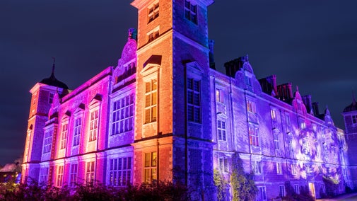 Blickling hall exterior lit up with colour for Christmas